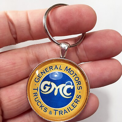 #ad Vintage General Motors GMC Trucks and Trailers Logo Sign Reproduction Keychain $12.95