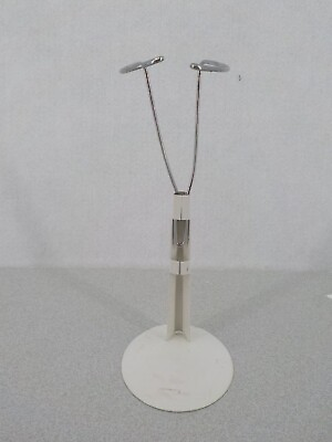 #ad DOLL STAND 5 1 2 INCH METAL STAND WITH BENDABLE ARMS TO FIT YOUR DOLL PREOWNED $4.49
