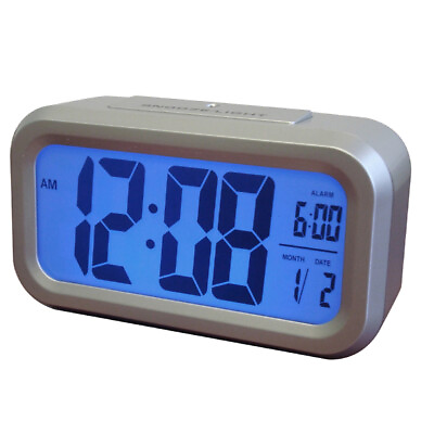 #ad Westclox LCD Alarm Clock 70045 Automatic Light Up Backlight Time Date Snooze New $23.49