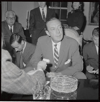 #ad New Yorks mayor Robert F Wagner looks up from desk during an ea 1962 Old Photo AU $8.50