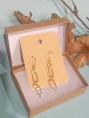 #ad Gold Paperclip Style Earrings $8.00