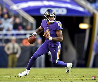 #ad Lamar Jackson Baltimore Ravens Unsigned Purple Jersey Scrambling Photo $39.99