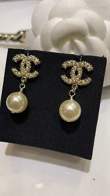 #ad Chanel Ear stud Gold Pearl Starburst CC Pearl pendant earrings $99.00