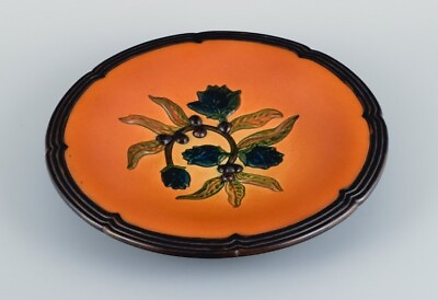 #ad Ipsens Denmark ceramic bowl with floral motif. Glaze in orange green shades. $270.00