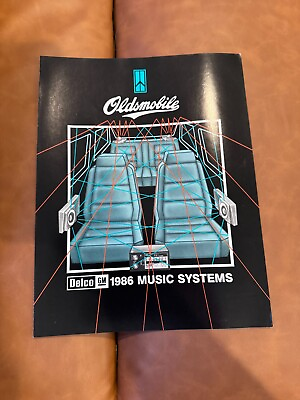 #ad 1986 Oldsmobile Music Brochure Toronado 98 Delta 88 Cutlass Ciera Calais Firenza $6.00