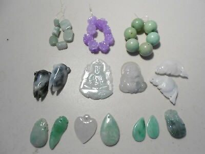 #ad 33pcs. loose craved jade pendants $140.00