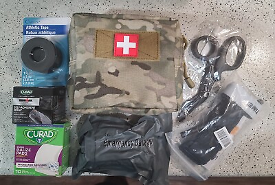#ad CP CAMO IFAK PACK. FILLED WITH TRAUMA FIRST AID SUPPLIES FOR ON THE GO. SAFETY $24.99