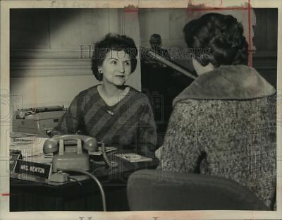 #ad 1966 Press Photo Violet Newton speaks with a customer at her Albany NY desk $19.99